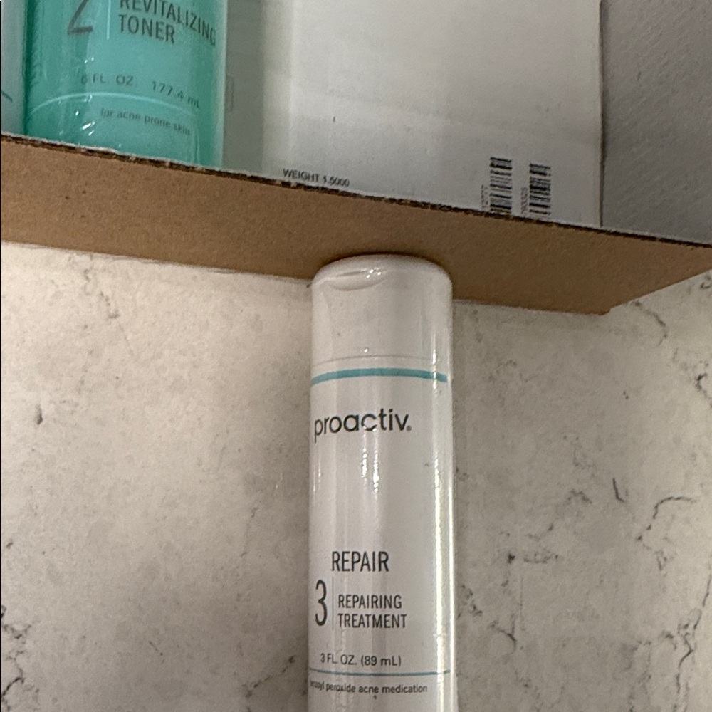 Proactiv Repairing Treatment in White and Teal